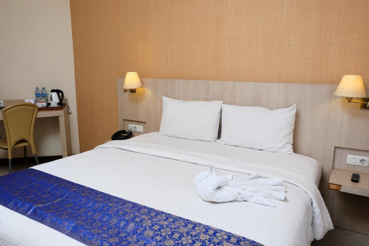 Rio City Hotel Palembang Exterior photo