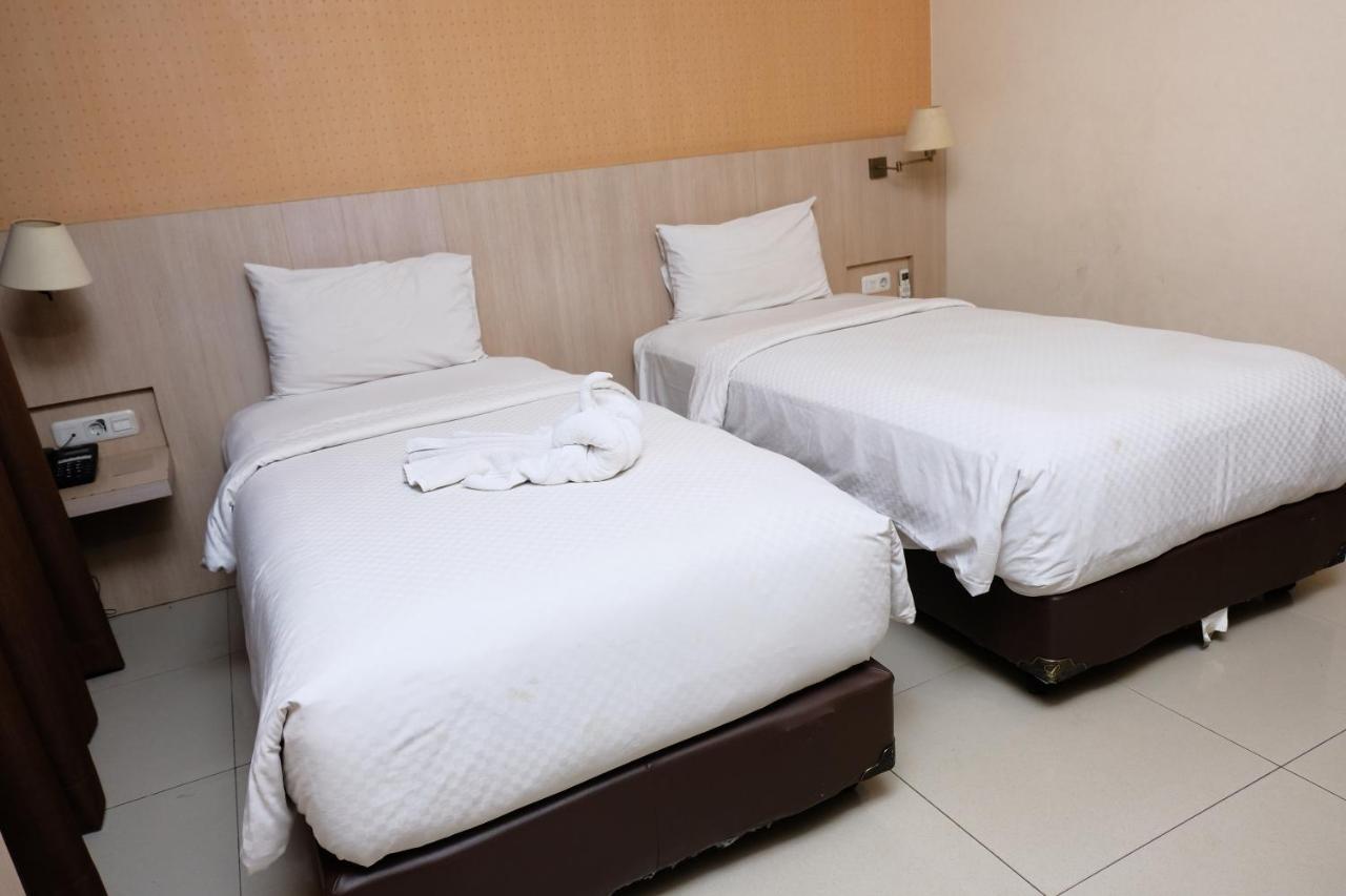 Rio City Hotel Palembang Exterior photo