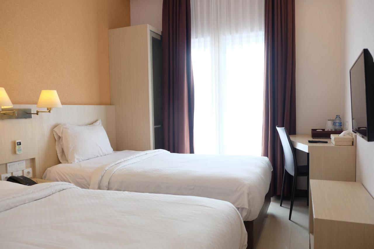 Rio City Hotel Palembang Exterior photo