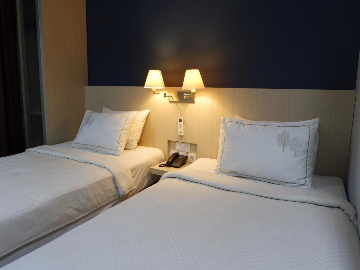 Rio City Hotel Palembang Exterior photo