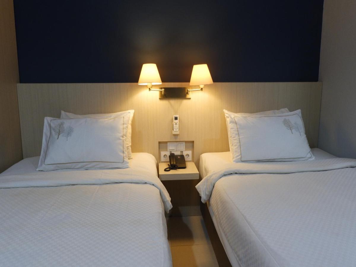 Rio City Hotel Palembang Exterior photo